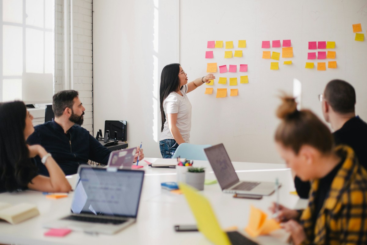 Team reviewing ideas together to align digital investments and strategic milestones