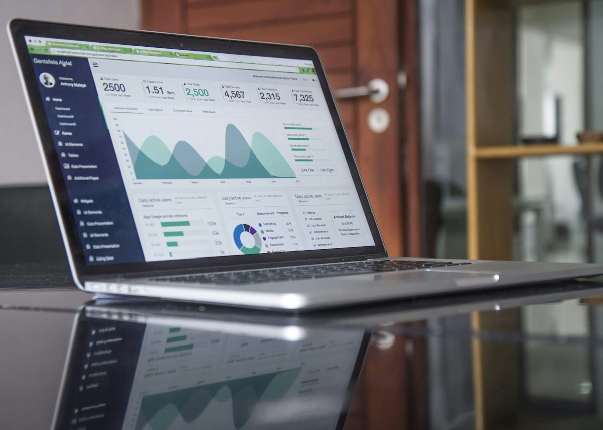 Laptop displaying digital analytics to support evidence-based priorities and reporting